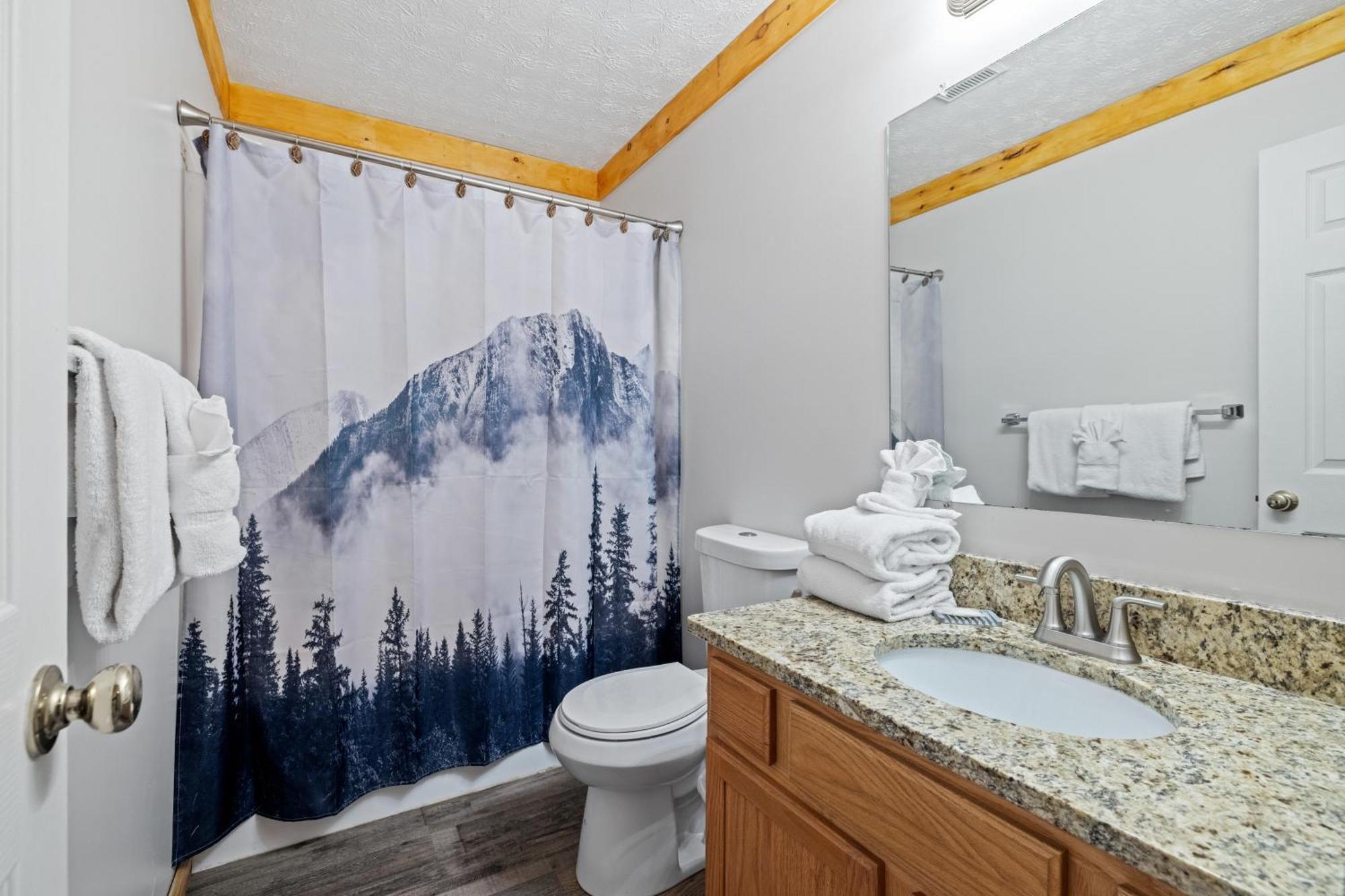 Lucky Charm Is An Inviting 3 Bedroom Retreat Nestled In The Woods Minutes From The Pkwy!