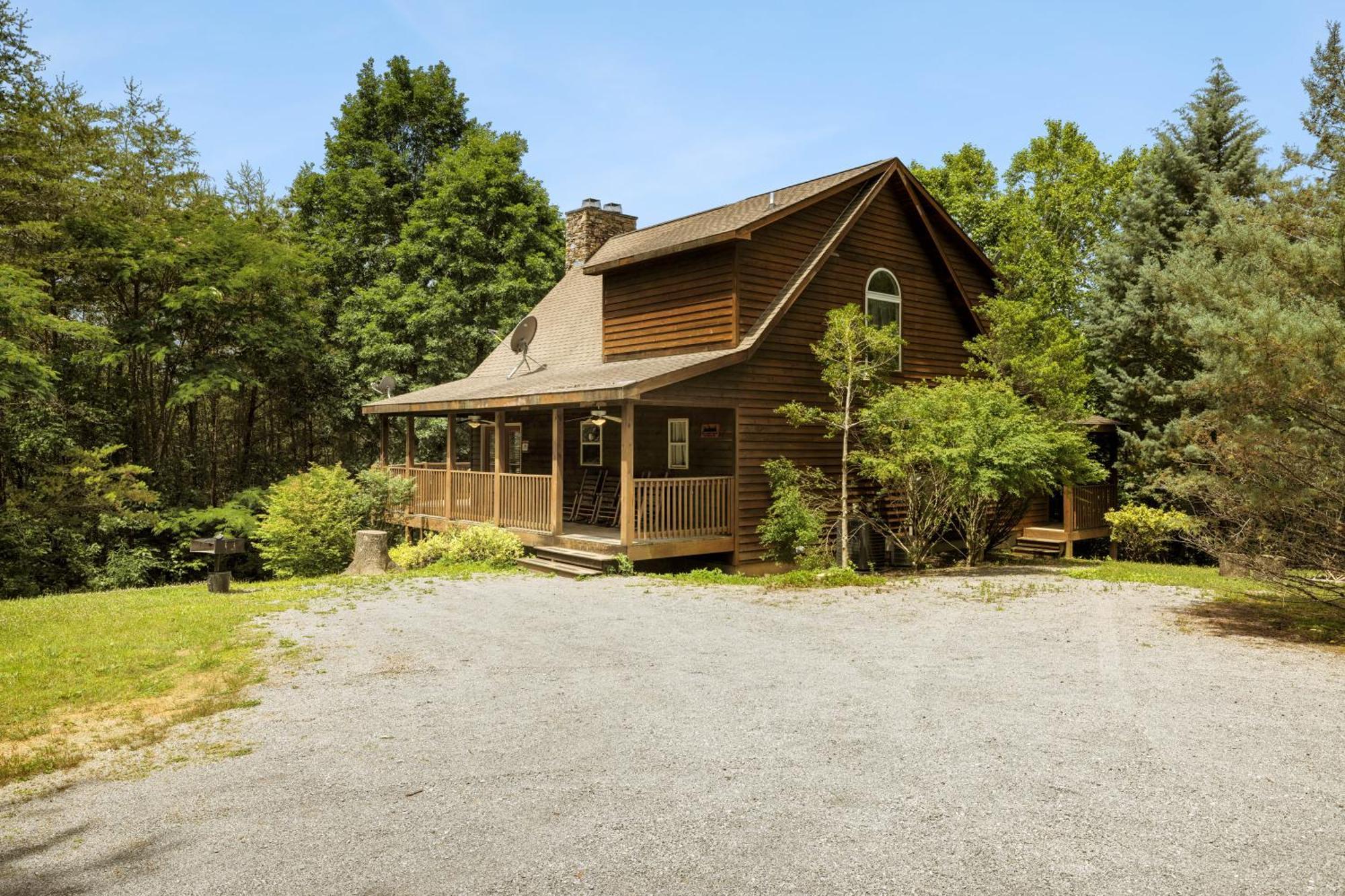 Lucky Charm Is An Inviting 3 Bedroom Retreat Nestled In The Woods Minutes From The Pkwy!